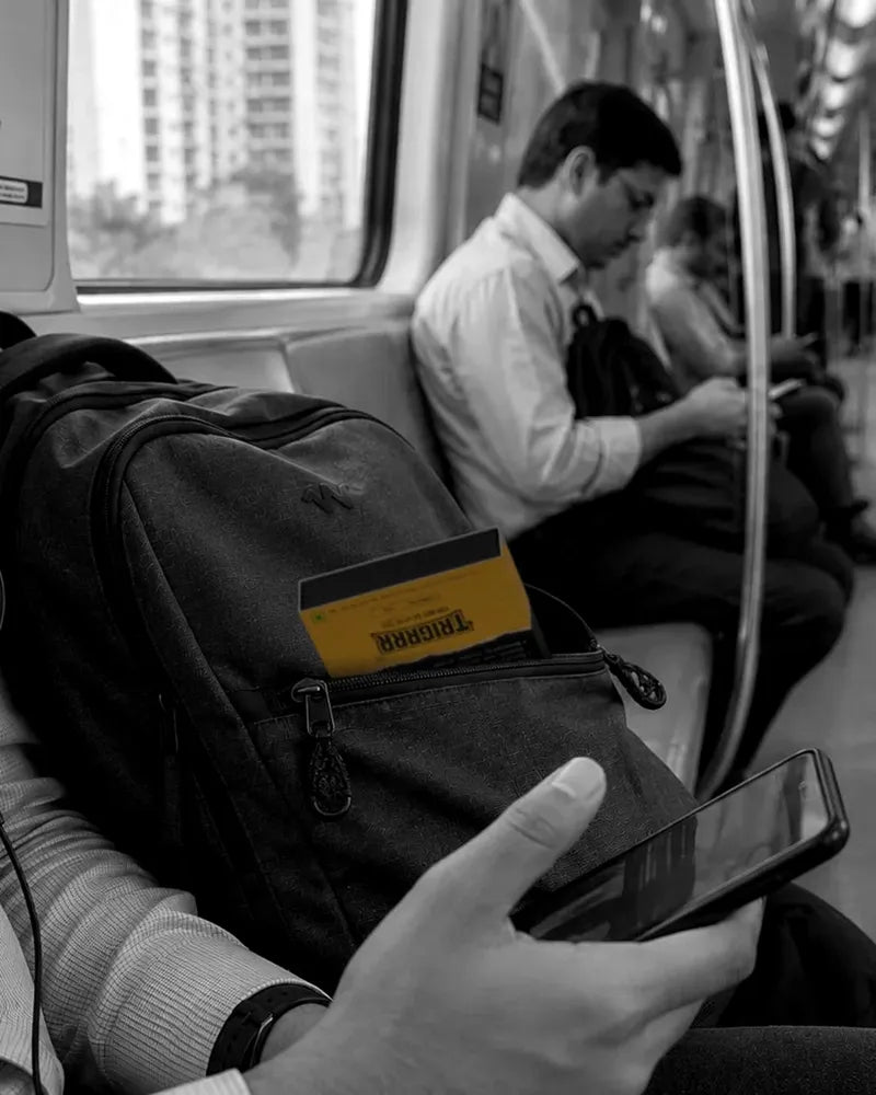 A Yellow Bullets box in the front pocket of an office backpack
